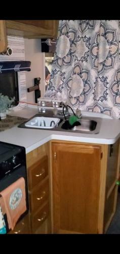 Rv With 3 Beds Plus Set Up Tent With One Bed Close To Everything