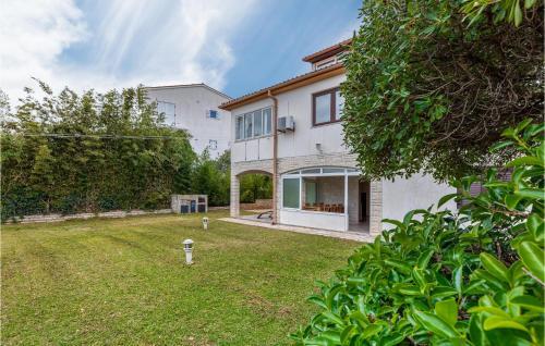 Amazing Home In Premantura With 5 Bedrooms