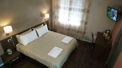 Hostal The White Building - [rooms]