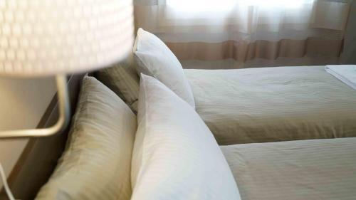 Hostal The White Building - [rooms]
