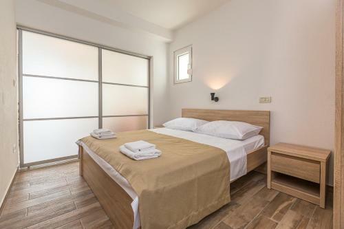 Apartmani Grmoja