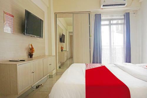 Hotel Capital O 91462 Pelangi Jp Apartment