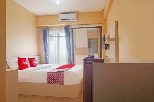 Hotel Capital O 91462 Pelangi Jp Apartment