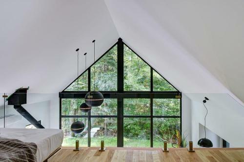 Large Windowed Chalet Surrounded By Nature