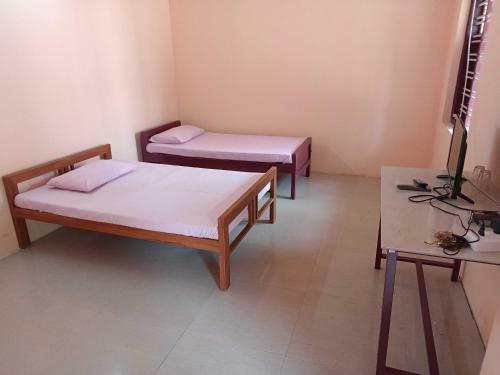 Hotel Pop 91925 Lekshmi Rooms & Villas