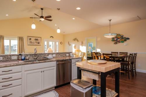 A Pawsitive Attitude By Oak Island Accommodations