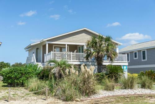 Footprints In The Sand By Oak Island Accommodations