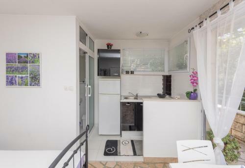 Apartmani Antunovi? Podgora
