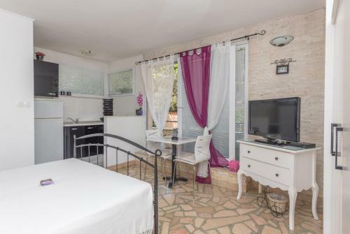 Apartmani Antunovi? Podgora