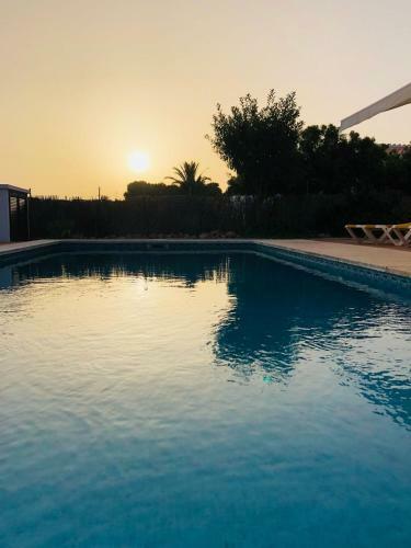 Casa Con Piscina Compartida En Addaia