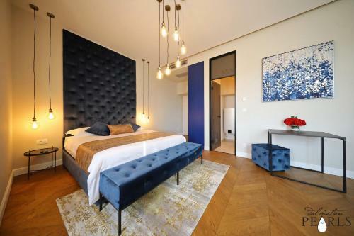 Apartamentos Three Pearls Deluxe Rooms