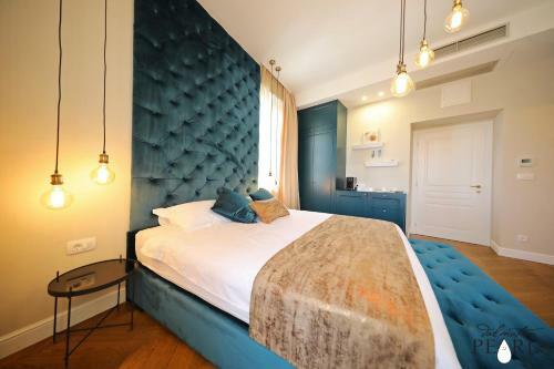 Apartamentos Three Pearls Deluxe Rooms