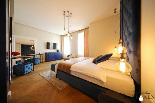 Apartamentos Three Pearls Deluxe Rooms