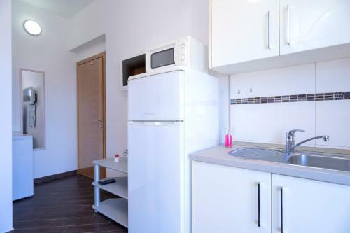 Hostal Rooms & Studio Villa Fio
