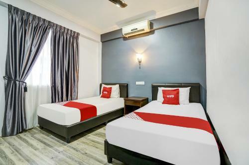 Capital O 90490 Zaques Hotel