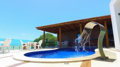 Casa Paradis�aca P� Na Areia.