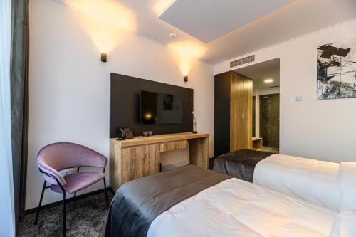 B The Hotel