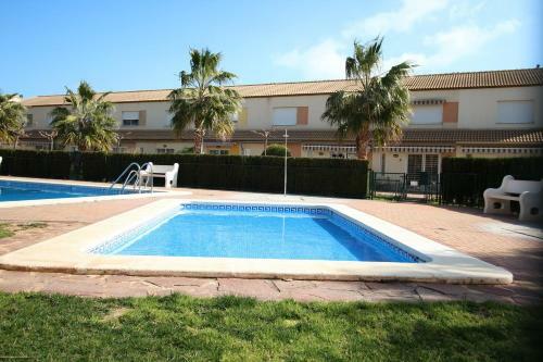 Casa De Vacaciones Con Piscina Comunitaria