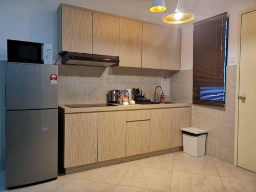 Apartamento Singgahsini Suite @ Atlantis Residences
