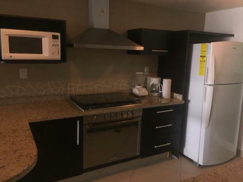 Apartamento Bay View Grand Marina Condo 1004s