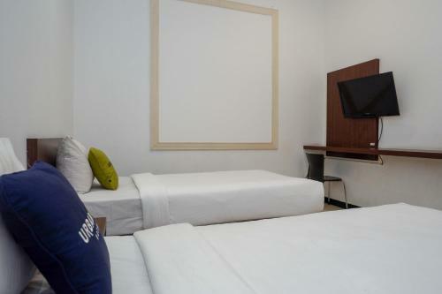 Urbanview Hotel Artama Simpang Lima
