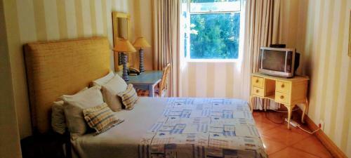 Hostal The Ambassador Suites