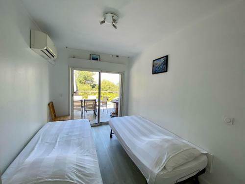 Apartamento Bas de Villa Avec Piscine, 7km de La Plage