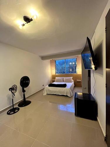 Theluxe Apartaestudio Laureles 4