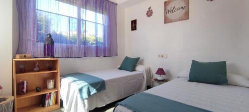 Tabarca Chalet Con Jard�n Y Piscina Comunitaria