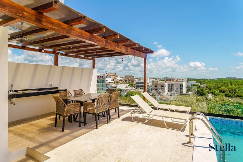 Apartamentos Grand Oceanview Condo With Rooftop Pools
