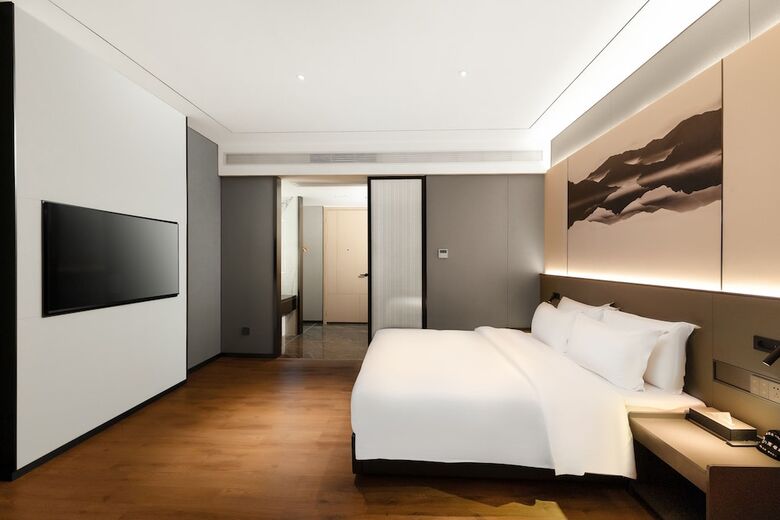 Hotel Mantuolunplusjiudian