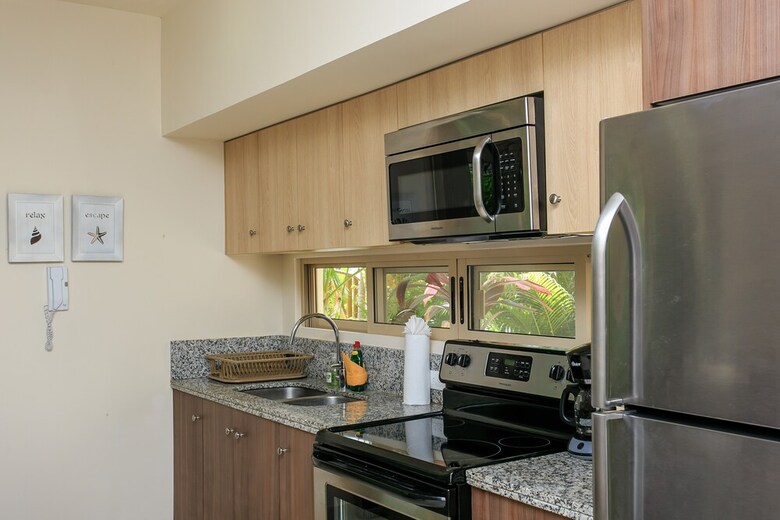 Apartamentos Condo Complex With An Alluring Pool & Tropical Vibes By Stella Rentals