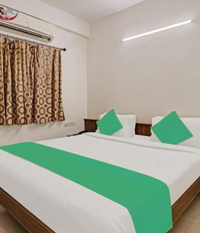 Hotel Fabexpress The Trinity Woods