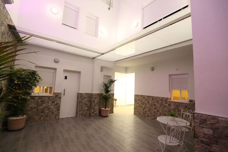Hostal Palmones