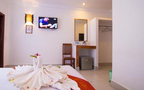 Hotel Blossoming Romduol Lodge
