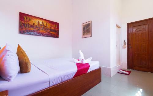 Hotel Blossoming Romduol Lodge