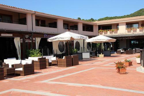 Apartamento Residence Portolaconia Appartamenti