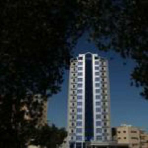 Apartamento Roomi Suites Hotel