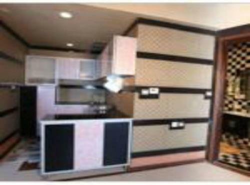 Apartamento Roomi Suites Hotel
