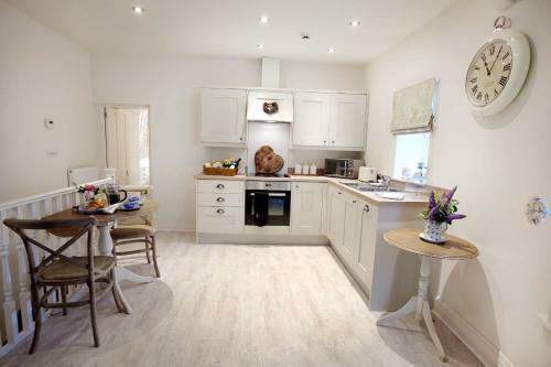 Apartamento Linton Court Coach House