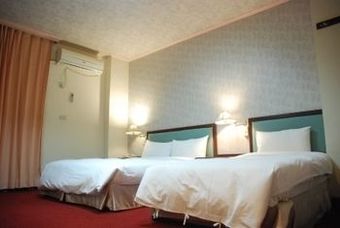 Apartamento Jiuning Business Hotel