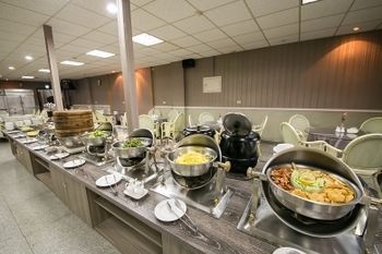 Apartamento Jiuning Business Hotel