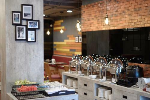 Aparthotel The Sunreno Serviced Apartment