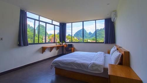 Bed & Breakfast Dragon's Den Hostel In Yangshuo