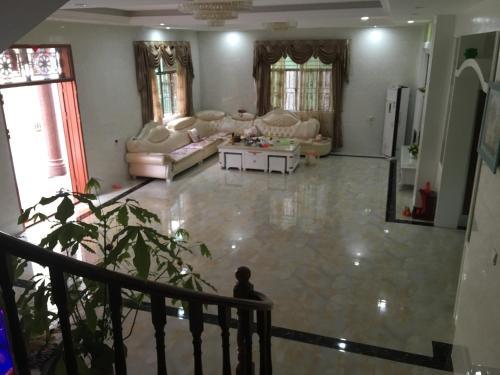 Apartamento Shuangyuewan Happy Inn