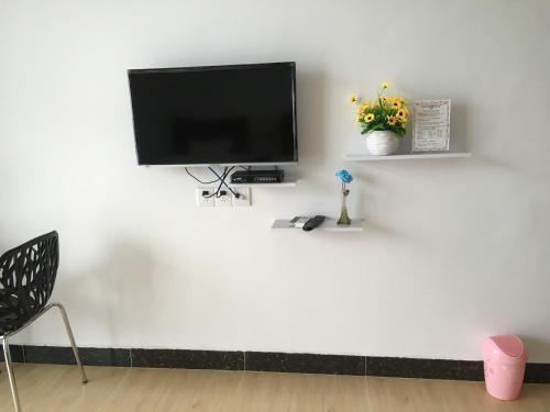 Apartamento Shuangyuewan Happy Inn