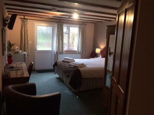 Posada The Crown Inn & Lodges