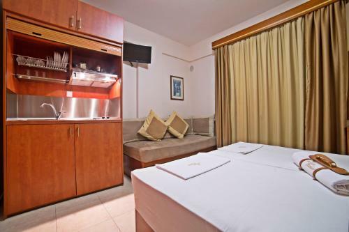 Apartamento Pioneer Excelsior Rooms