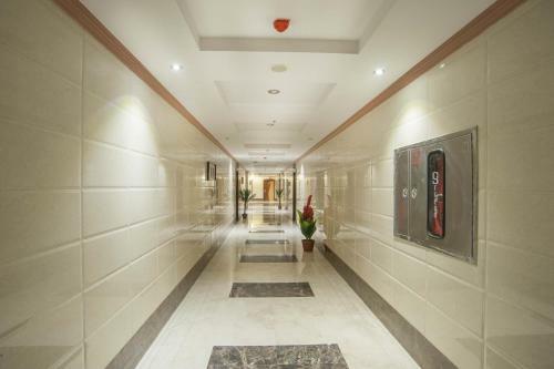 Apartamento Al Ezzah Palace Hotel Suites
