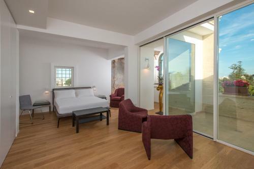 Hostal Le Bifore Charming House